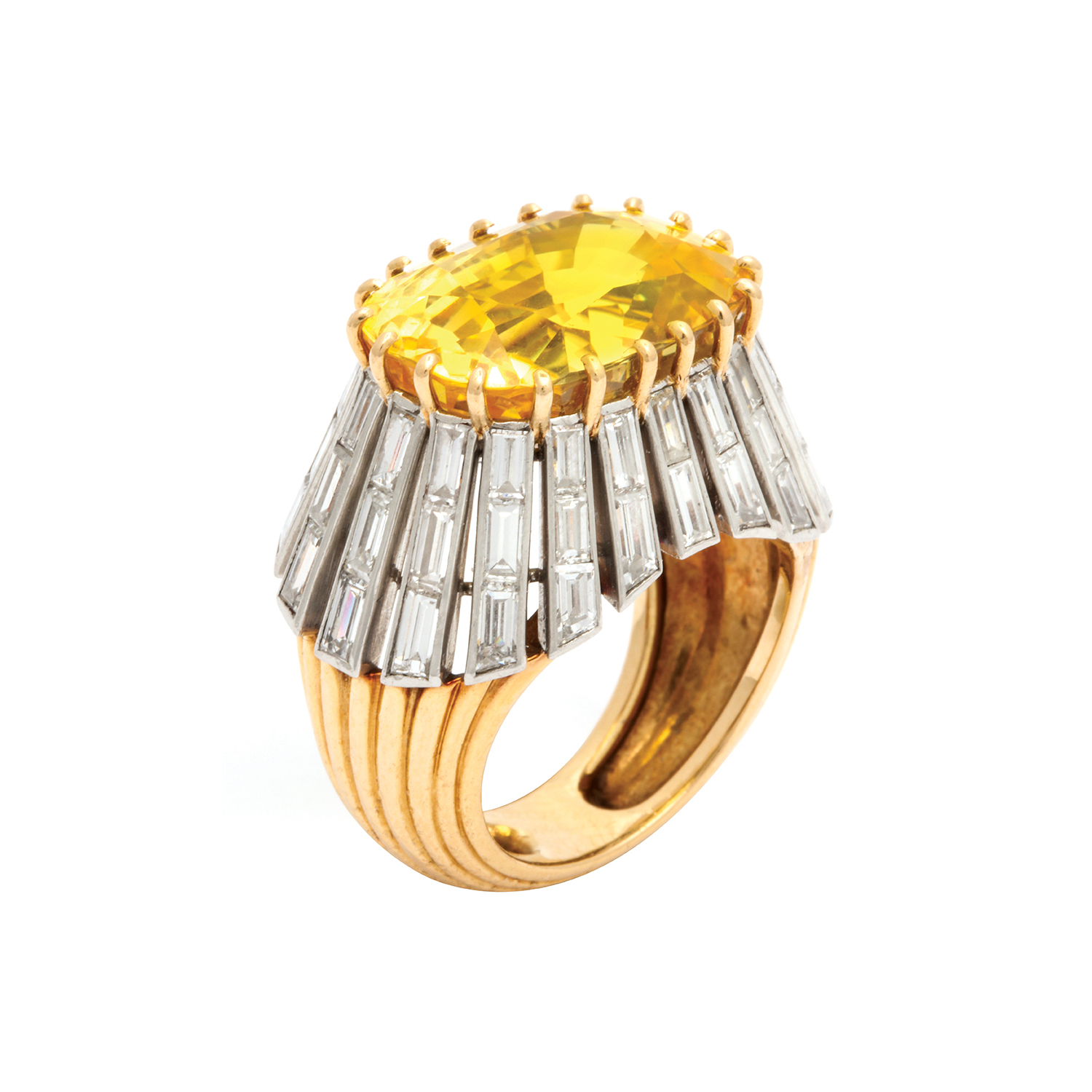 main view of yellow sapphire cocktail ring set in a gold and baguette-cut diamond mount