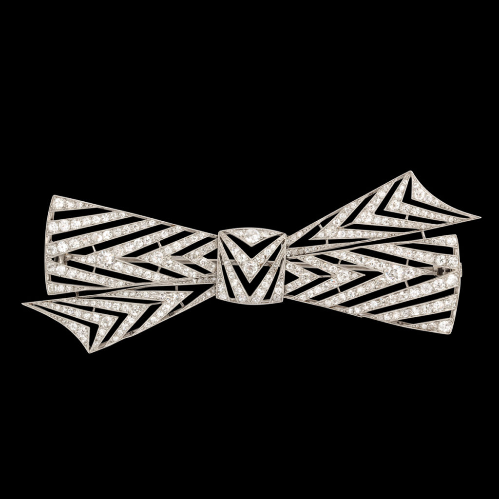 Diamond Bow Brooch by Janesich on black background