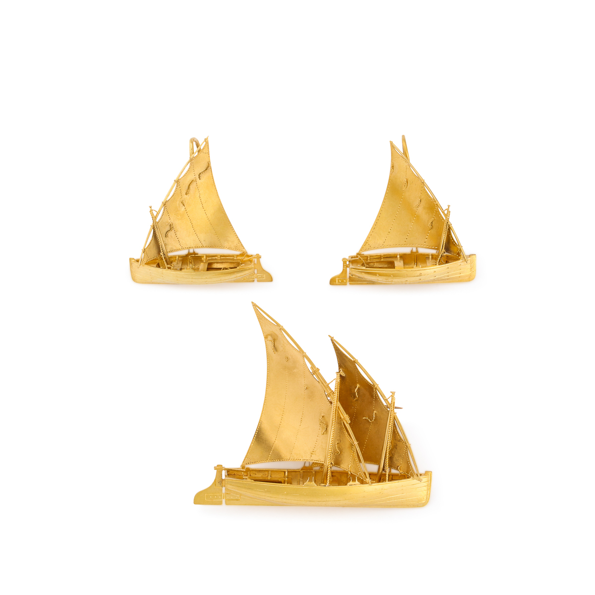 group shot of Antique Gold Sailboat Brooch and Earrings