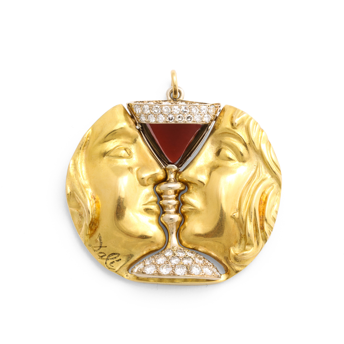 Gold brooch depicting two faces in profile with a diamond and garnet chalice between them