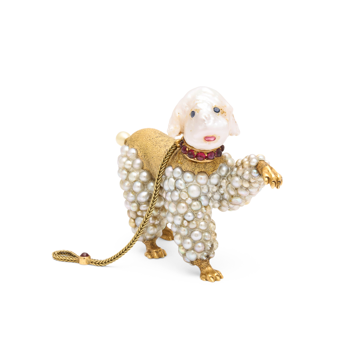 Gold poodle with baroque pearl head and pearl body, with one paw lifted.