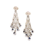 back view of diamond lozenge shaped pendant earrings set with cabochon sapphires