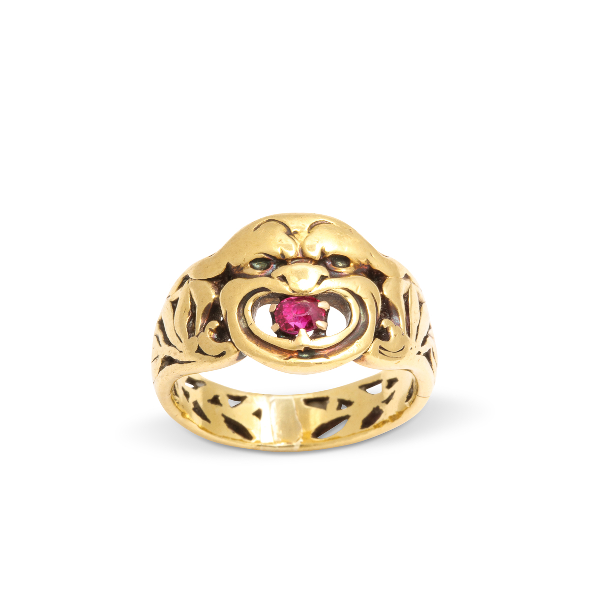 front view of gold Victorian gargoyle ring set with a ruby