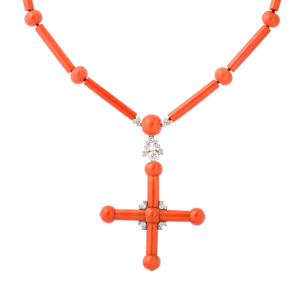 Front view of coral and diamond cross necklace