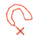 another view of coral and diamond cross necklace illustrating the full length