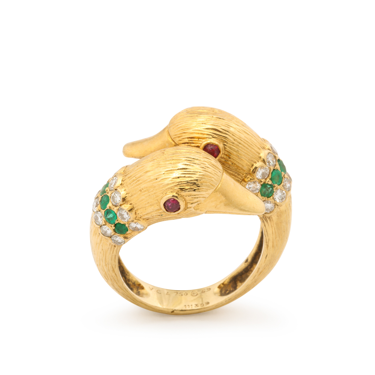 main view of 1960s gold ring style as two embracing ducks with ruby eyes, set with diamonds end emeralds