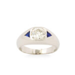 main view of platinum man's ring set with diamond and triangular sapphire shoulders
