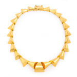 main view of Art Deco gold necklace with a geometric design of linked cones