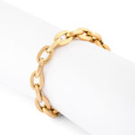 18k gold heavy link bracelet illustrated on a tube
