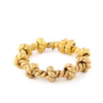 another view of 18k gold knotted rope bracelet