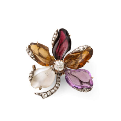 five-petal flower brooch with moonstone, citrine, and amethyst petals and set with diamonds