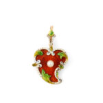 red enamel twisted heart pendant with white enamel border, green enamel leaves, and a pearl in the center