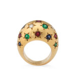 another view ofgold bombe ring set with emeralds, sapphires, rubies, and diamonds