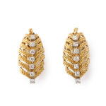 gold leaf-shaped earrings with a row of diamonds down the center