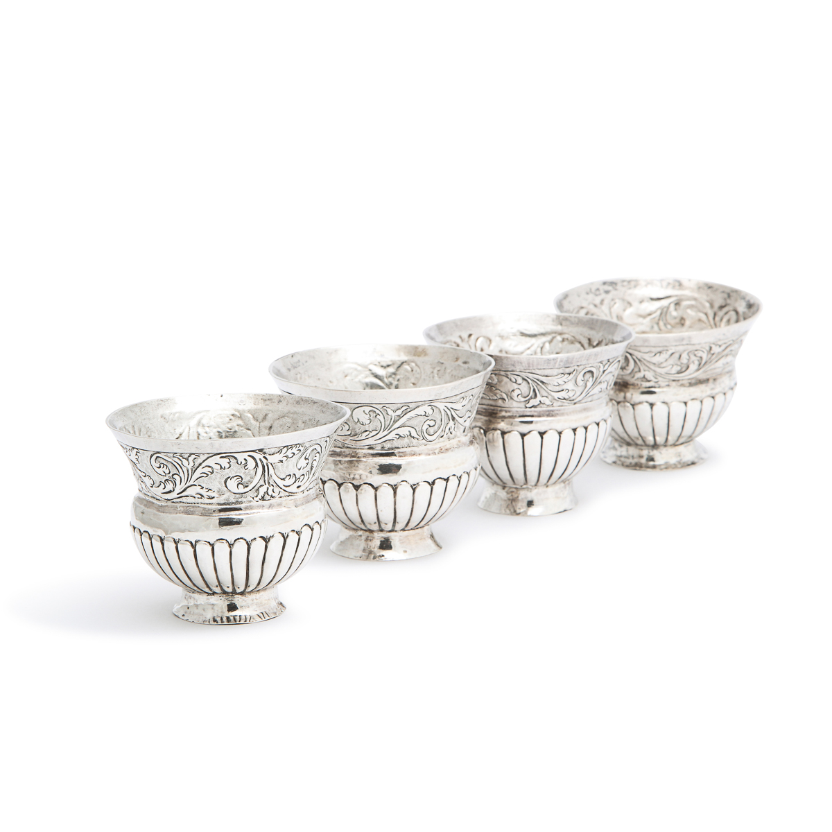 group of four silver thistle-form charki with acanthus leaf decoration