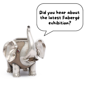 silver and sandstone elephant sculpture facing front towards the right. With a speech bubble that says, did you hear about the latest Faberge exhibition?