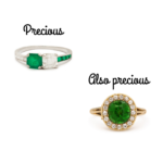 emerald and diamond ring compared with a green garnet and diamond ring to show that they are both precious gemstones